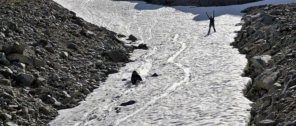 Bum sliding down the glacier