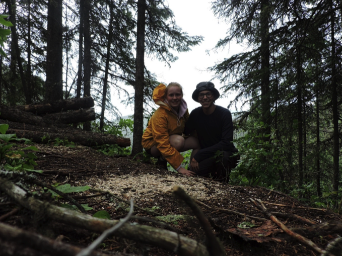 two people in the forest