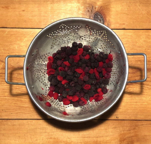 berries in strainer