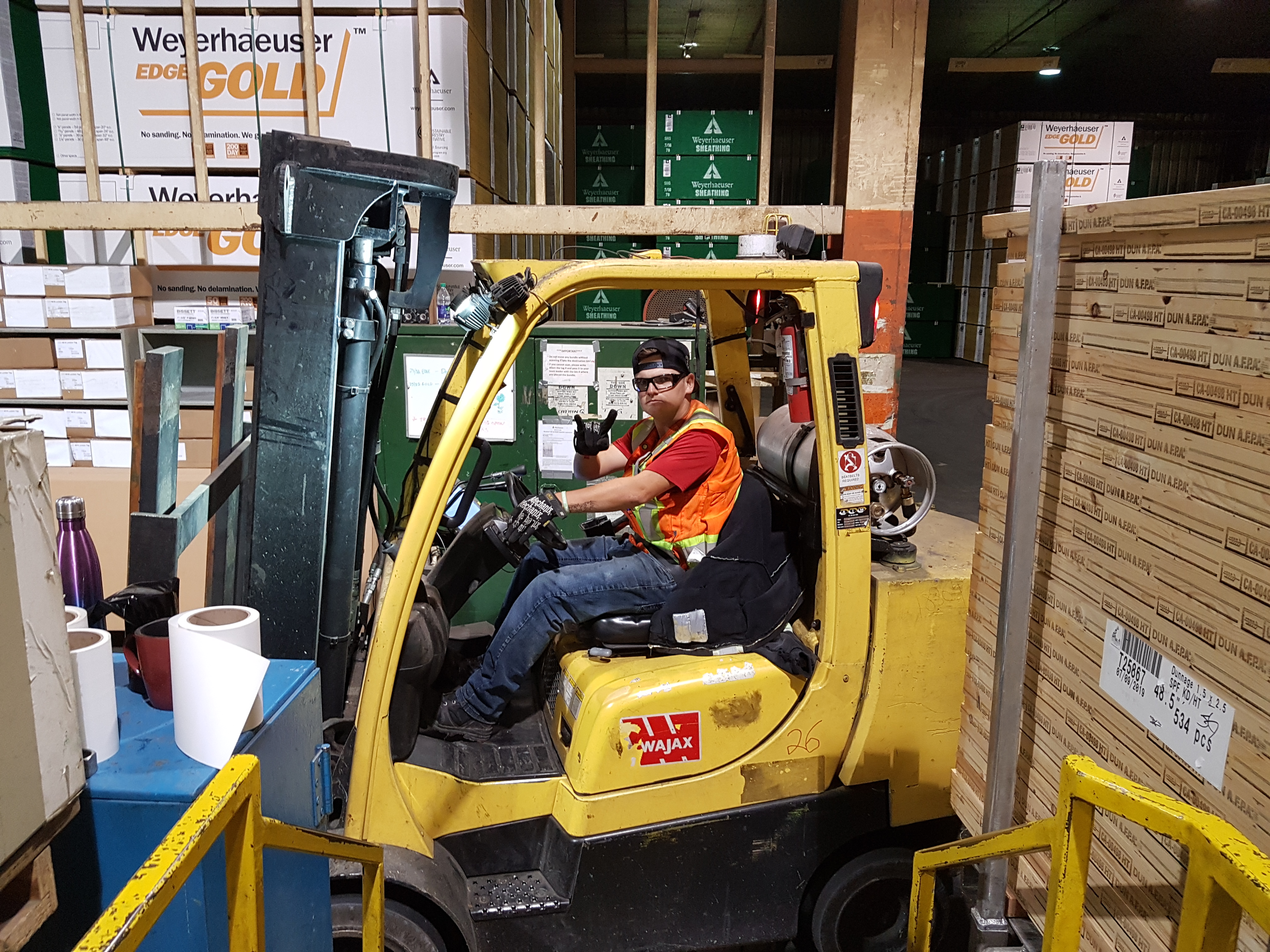 man driving forklift