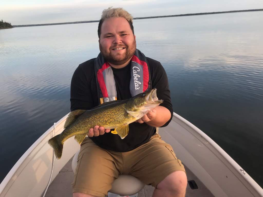 man holding fish