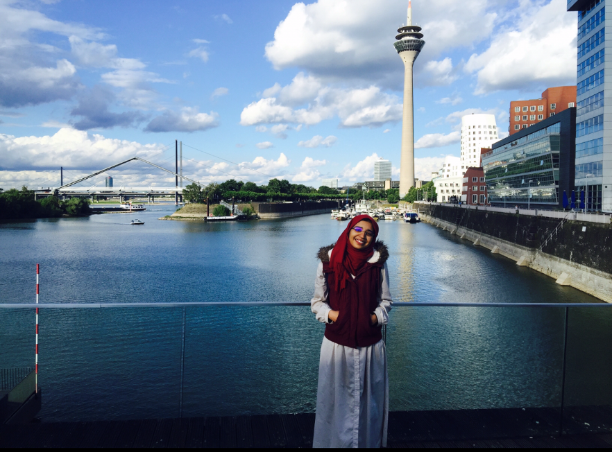 Lina overlooking water in Germany. 